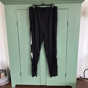 NWT HOLLOWAY black traction pant, has a zipper at the side bottom of pan…